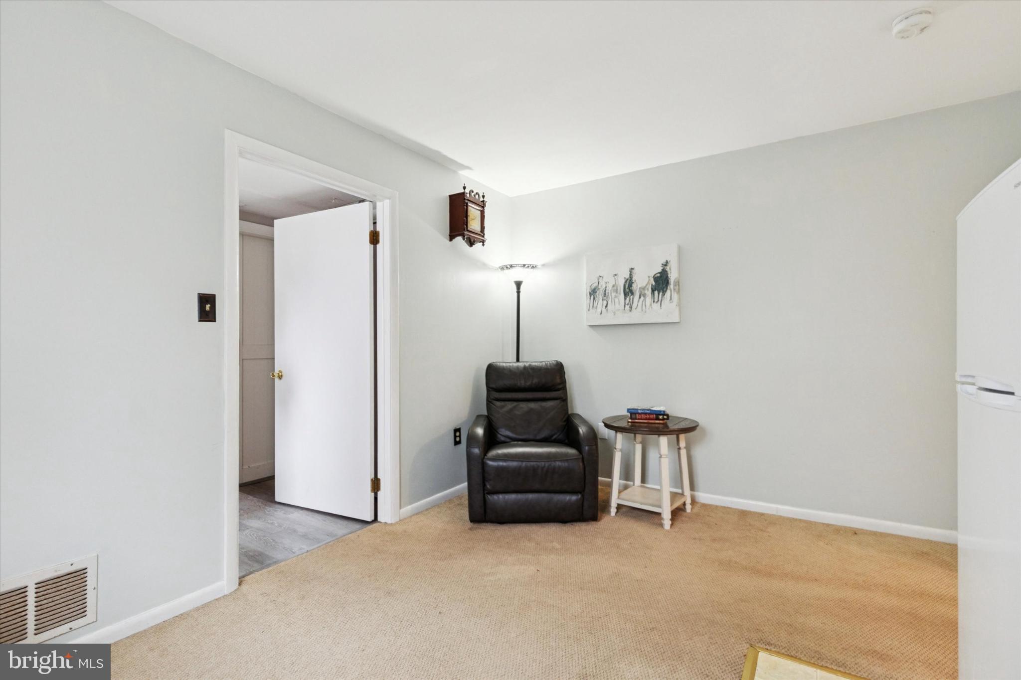108 Devon Road Chalfont, PA 18914 - Photo 10 of 30 a living room with furniture and a flat screen tv
