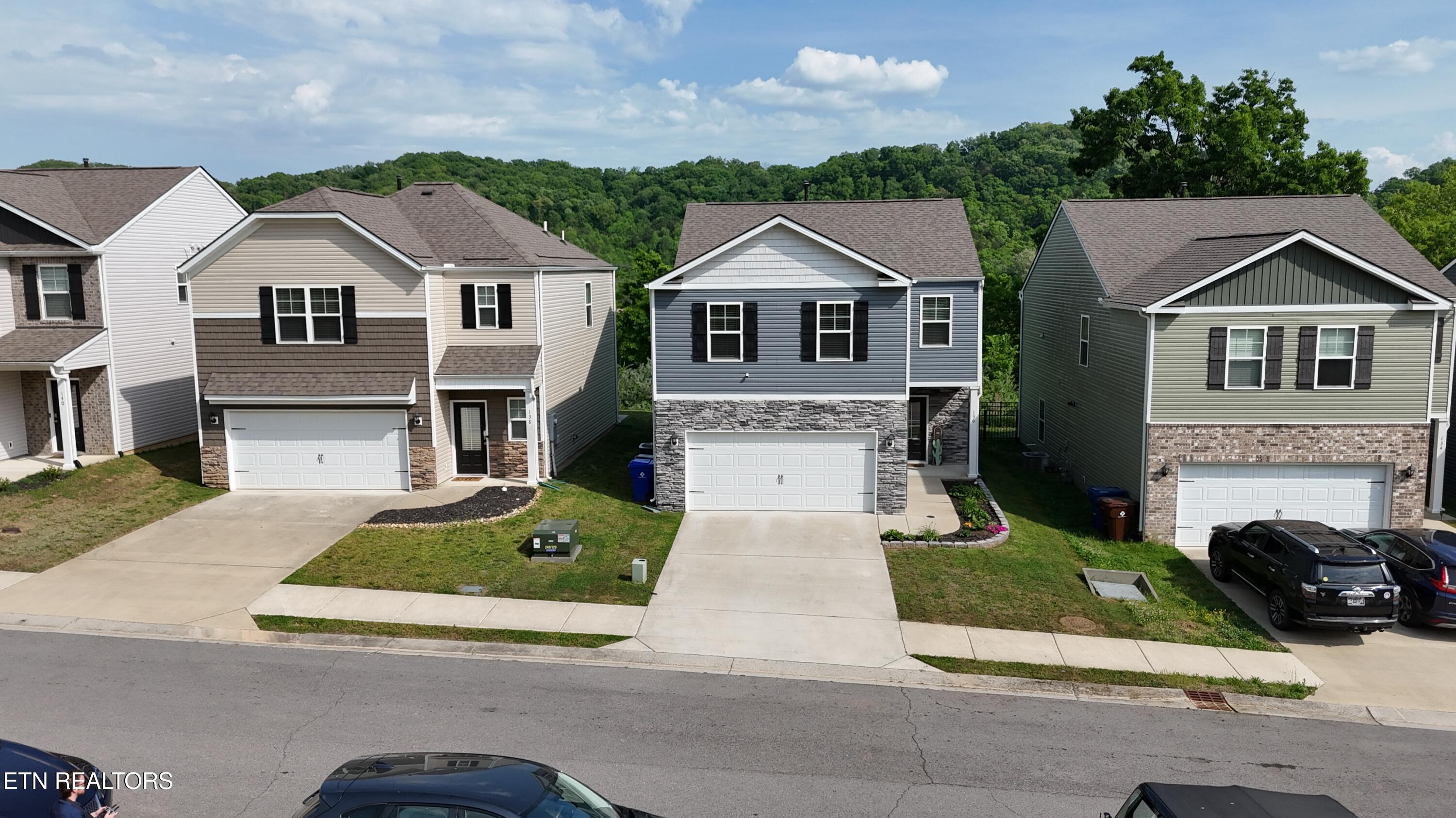 136 Centennial Vlg Drive Oak Ridge, TN 37830 - Photo 2 of 36 dji_fly_20260424_163744_0083_17771413637