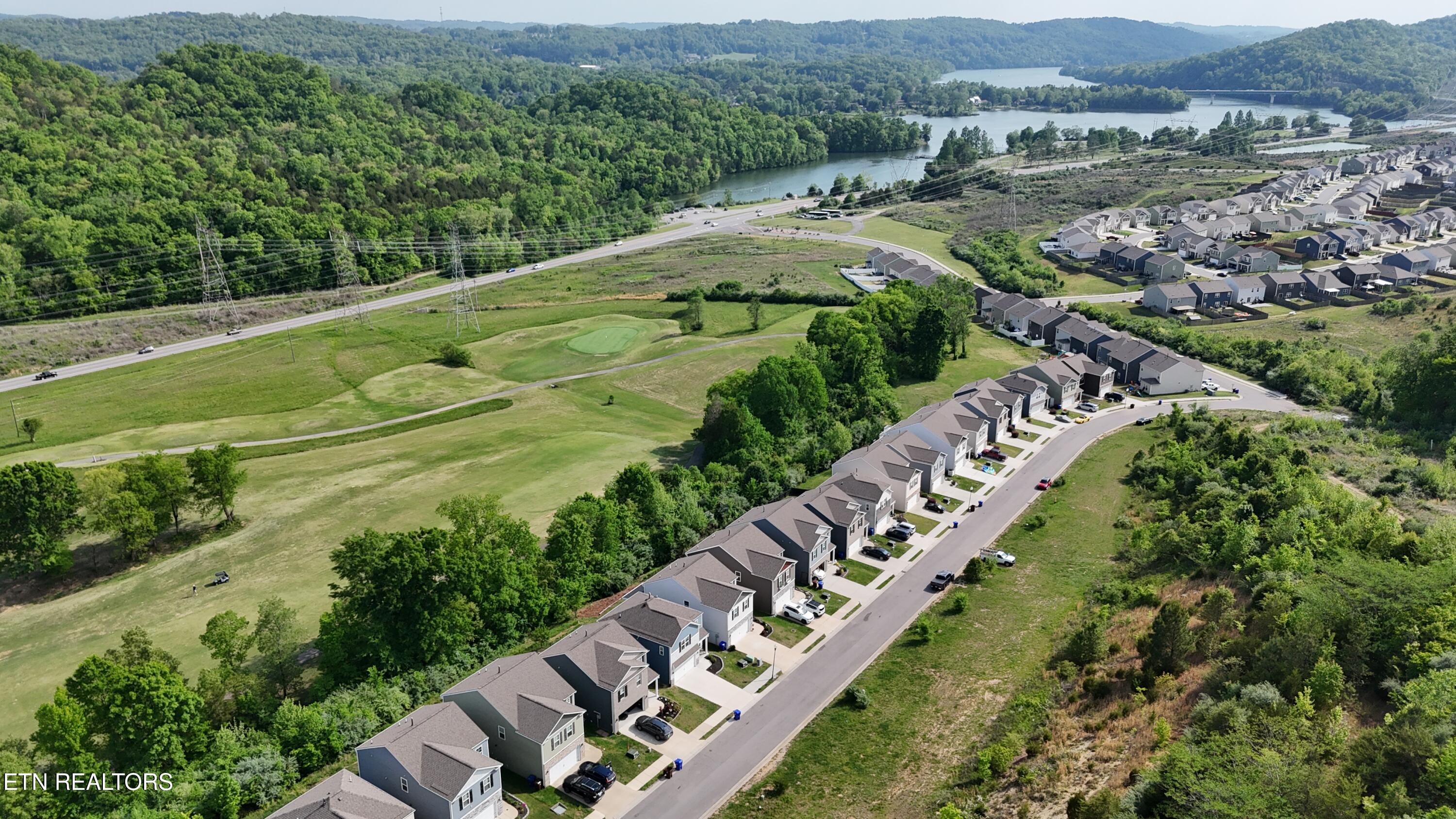 136 Centennial Vlg Drive Oak Ridge, TN 37830 - Photo 4 of 36 dji_fly_20260424_163834_0085_17771413643