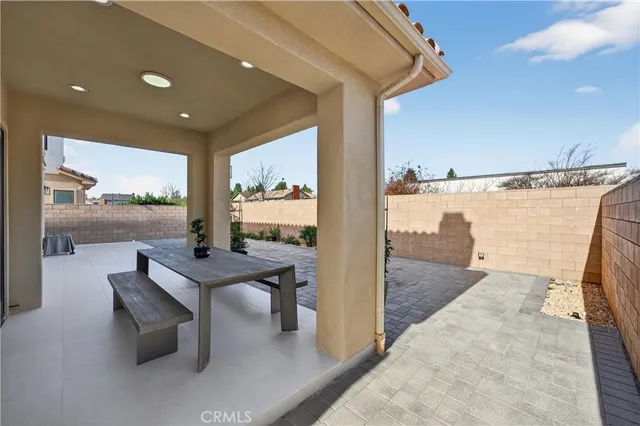 a view of a living room and dining room