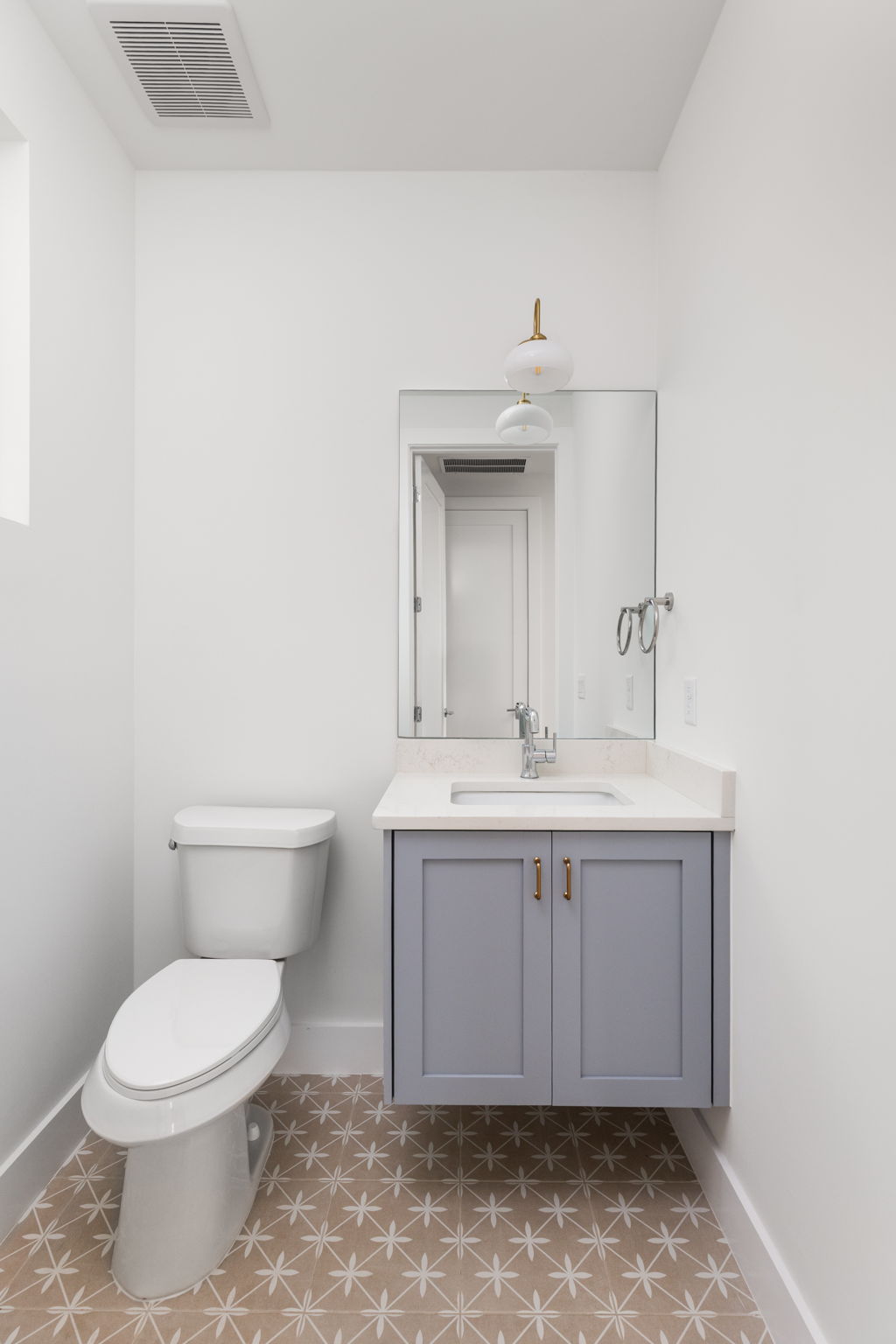 408 Linden Street, Unit B Austin, TX 78702 - Photo 17 of 40 Half bath featuring vanity and baseboards