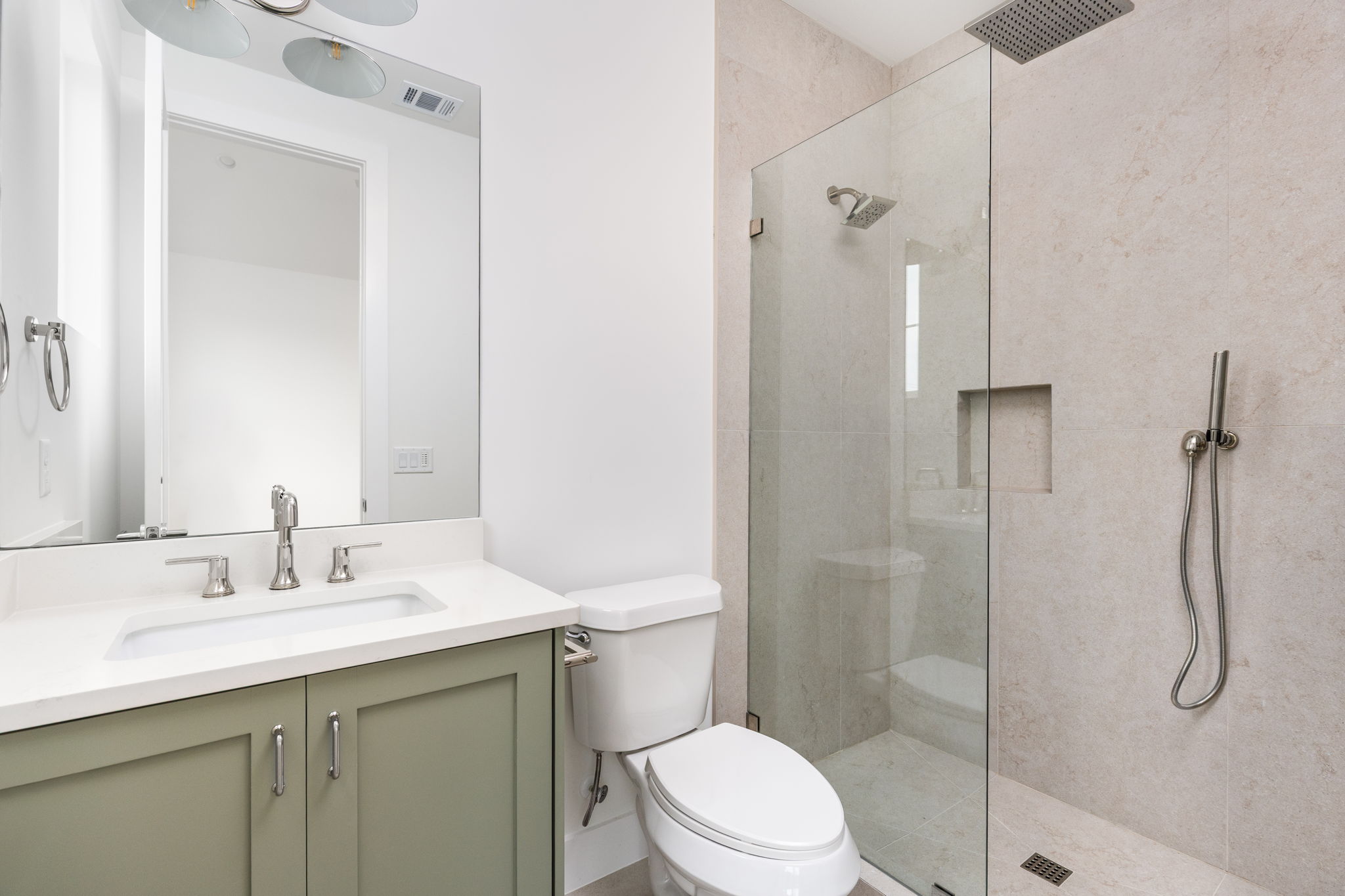 408 Linden Street, Unit B Austin, TX 78702 - Photo 23 of 40 Full bath with vanity and a walk in shower