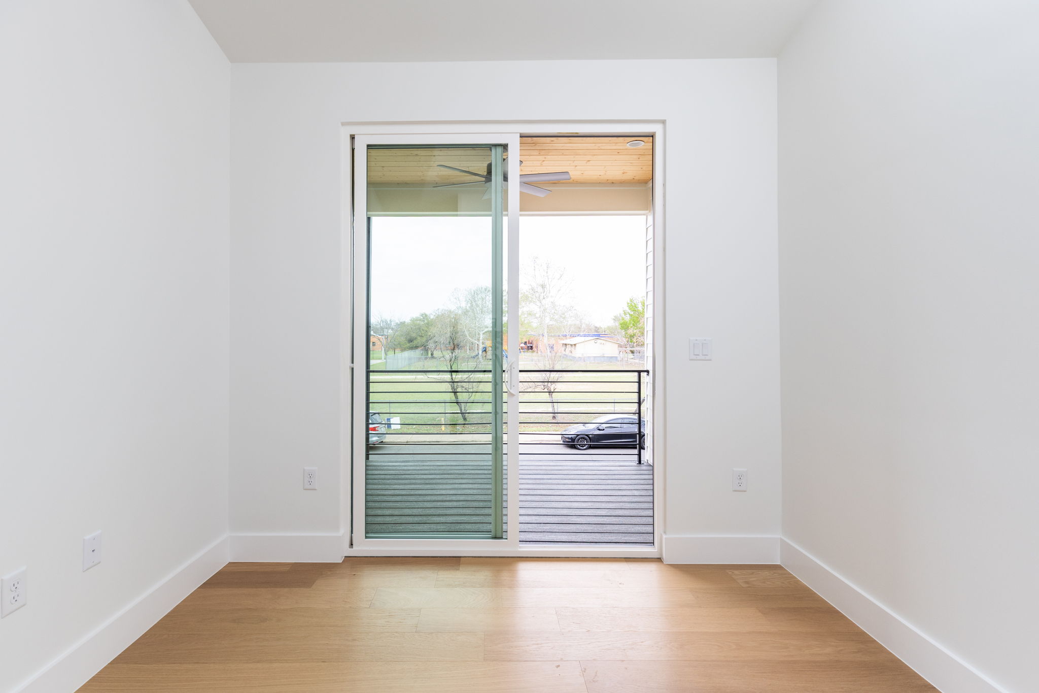 408 Linden Street, Unit B Austin, TX 78702 - Photo 26 of 40 Unfurnished room featuring light wood-type flooring and baseboards