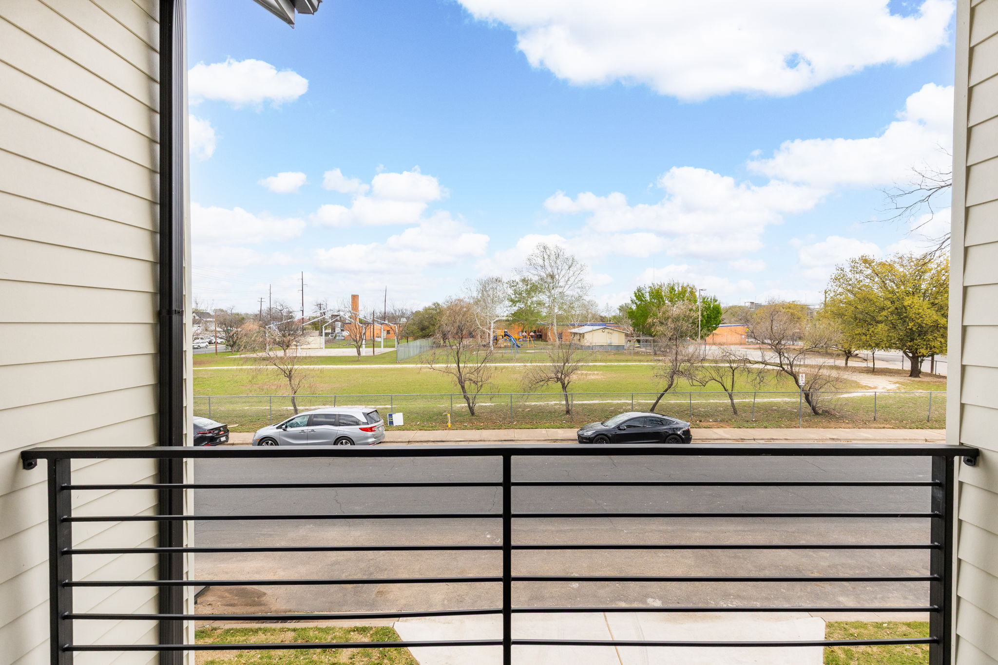 408 Linden Street, Unit B Austin, TX 78702 - Photo 28 of 40 Gate with a balcony and a residential view