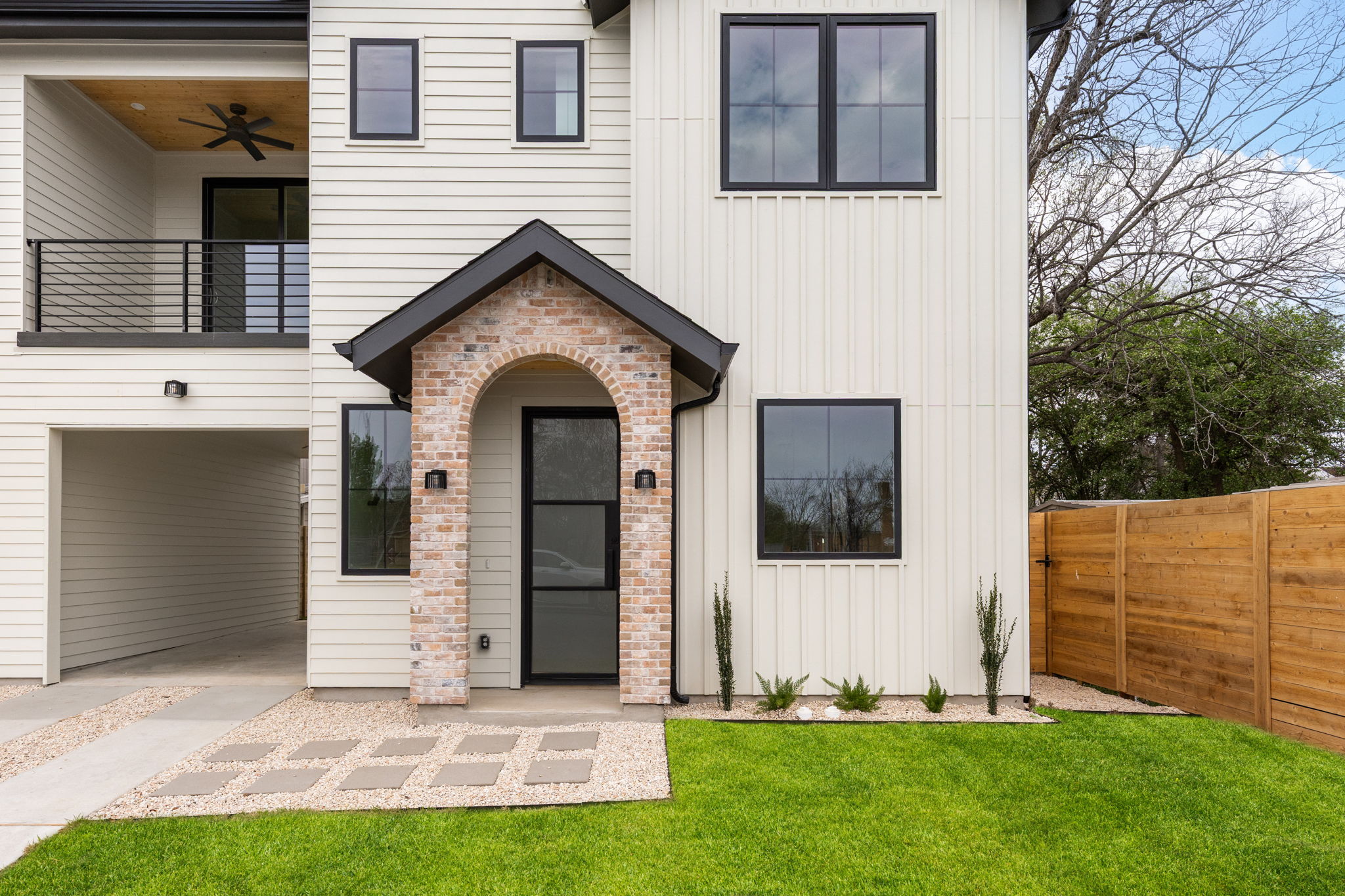 408 Linden Street, Unit B Austin, TX 78702 - Photo 5 of 40 View of front of property featuring board and batten siding, a balcony, and a ceiling fan