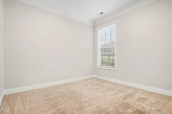 a view of a balcony with wooden floor