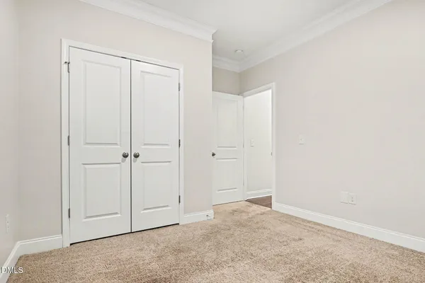 a view of porch with wooden floor and floor to ceiling window