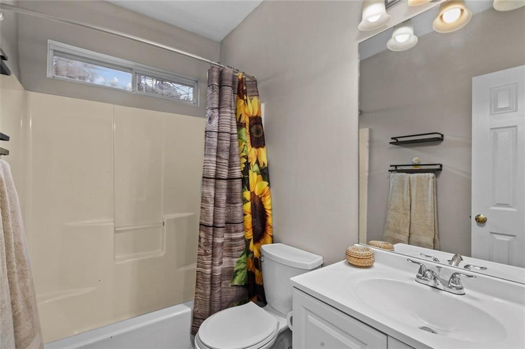 304 Ridge Hill Circle Canton, GA 30115 - Photo 22 of 42 a bathroom with a sink toilet and shower