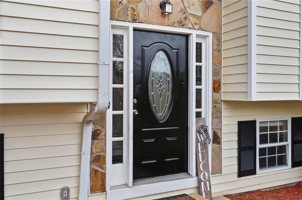 304 Ridge Hill Circle Canton, GA 30115 - Photo 38 of 42 a front view of a house with a door