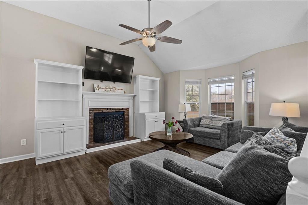 304 Ridge Hill Circle Canton, GA 30115 - Photo 8 of 42 a living room with furniture fireplace and flat screen tv