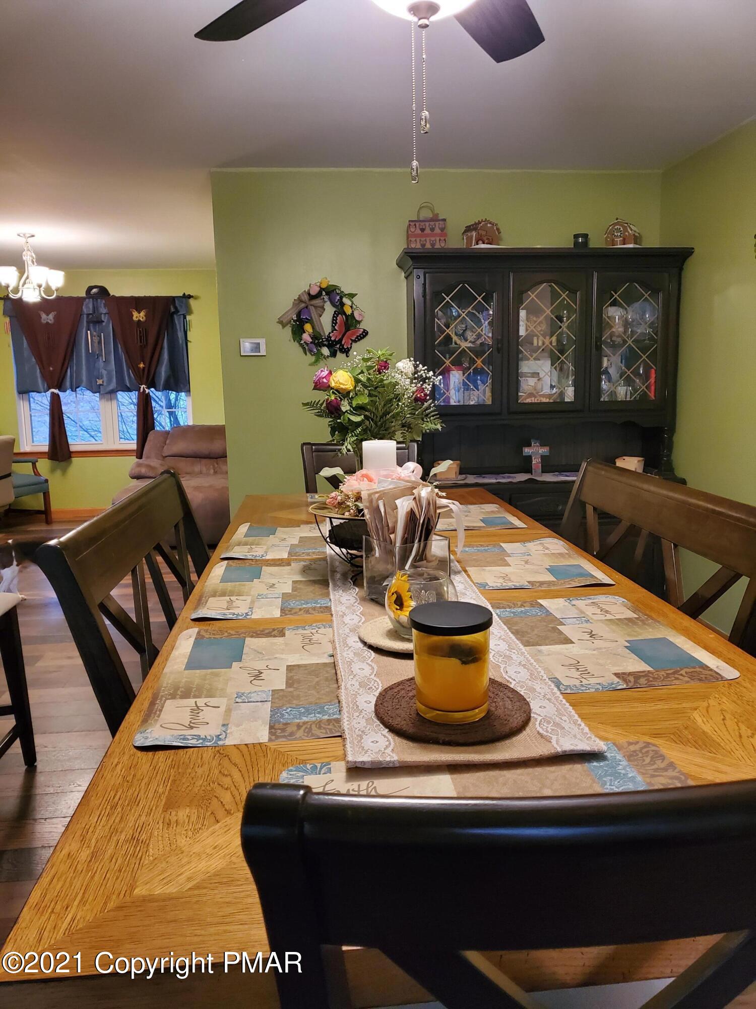 590 Henry's Crossing Road Cresco, PA 18326 - Photo 13 of 31 a room with furniture and a flat screen tv