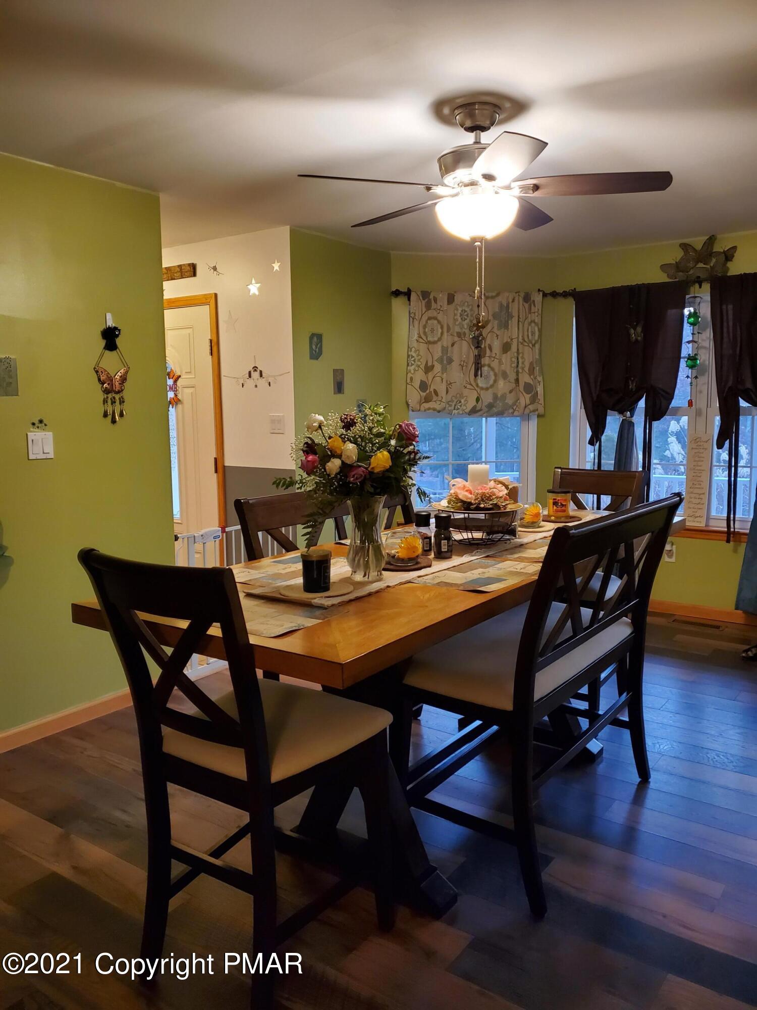 590 Henry's Crossing Road Cresco, PA 18326 - Photo 14 of 31 a view of a dining room with furniture