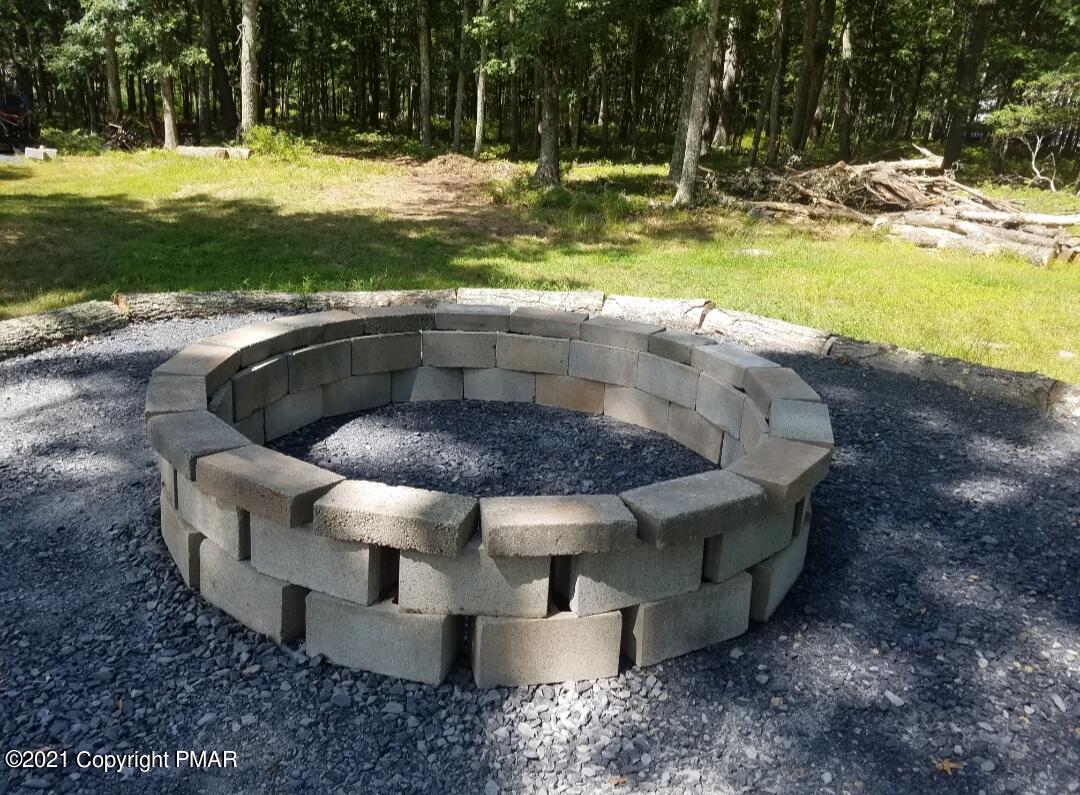 590 Henry's Crossing Road Cresco, PA 18326 - Photo 26 of 31 a view of a swimming pool with a yard