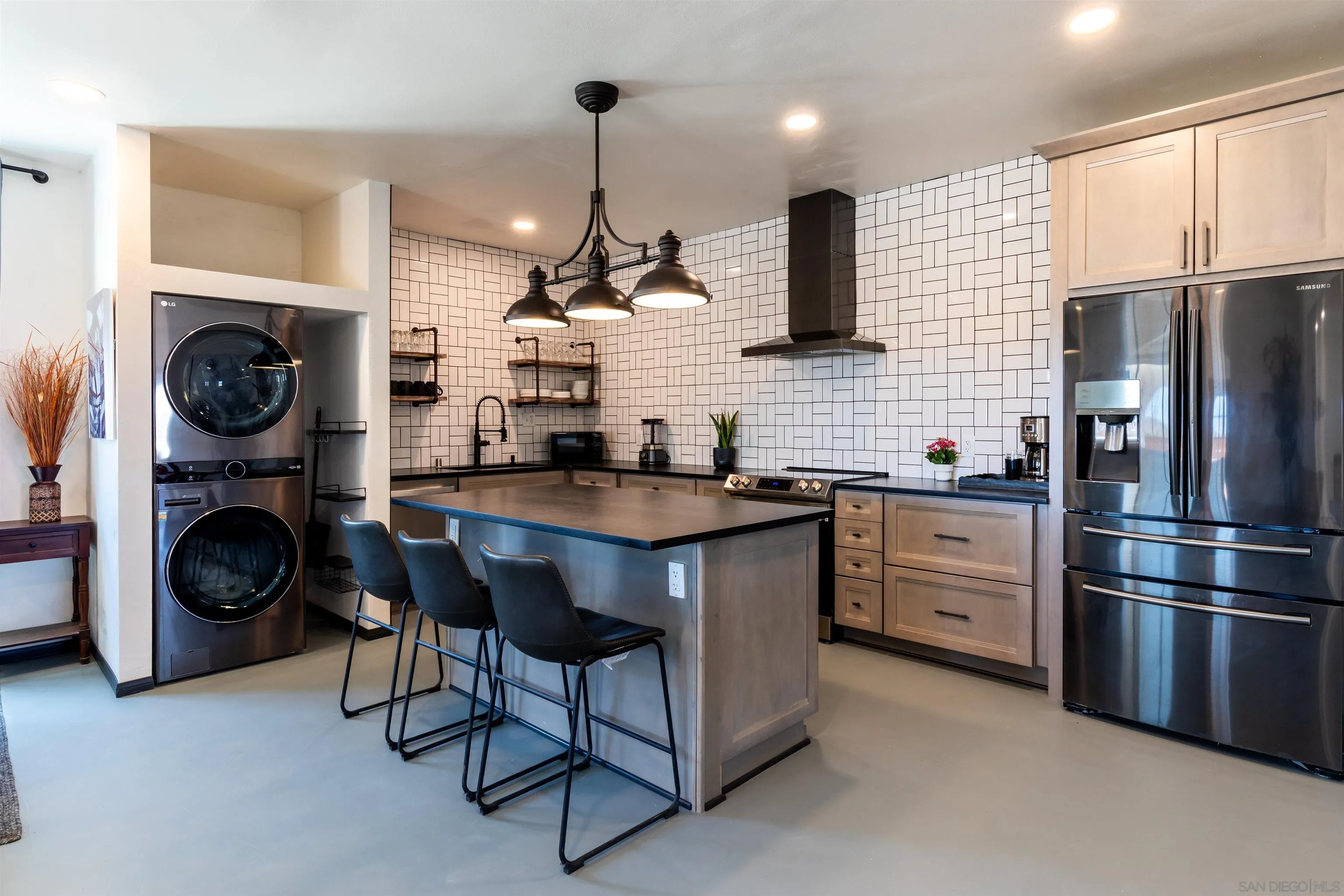 5066 Lear Avenue Twentynine Palms, CA 92277 - Photo 2 of 69 a kitchen with stainless steel appliances granite countertop a stove a sink a oven and a refrigerator