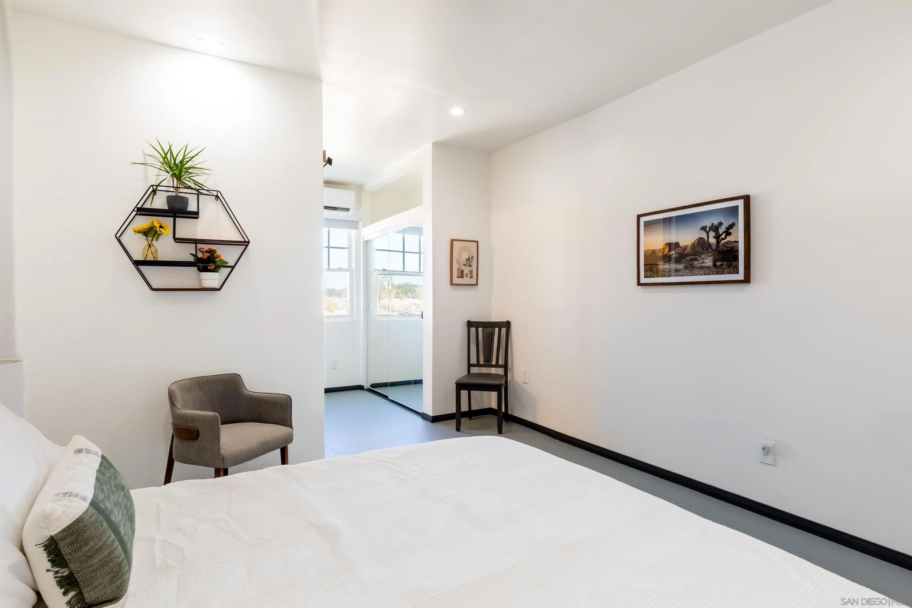 5066 Lear Avenue Twentynine Palms, CA 92277 - Photo 30 of 69 a bedroom with furniture and a window