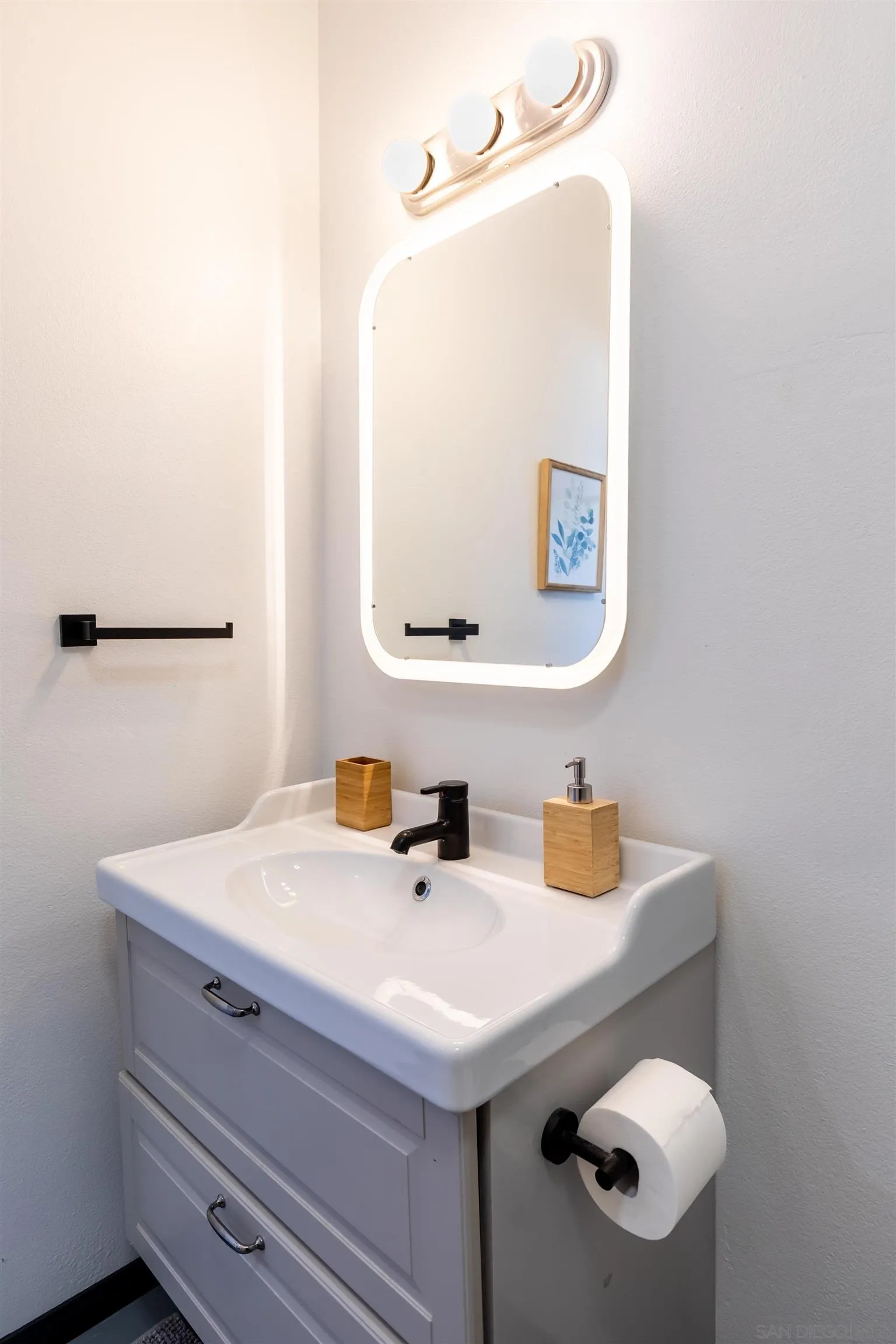 5066 Lear Avenue Twentynine Palms, CA 92277 - Photo 34 of 69 a bathroom with a sink and a mirror