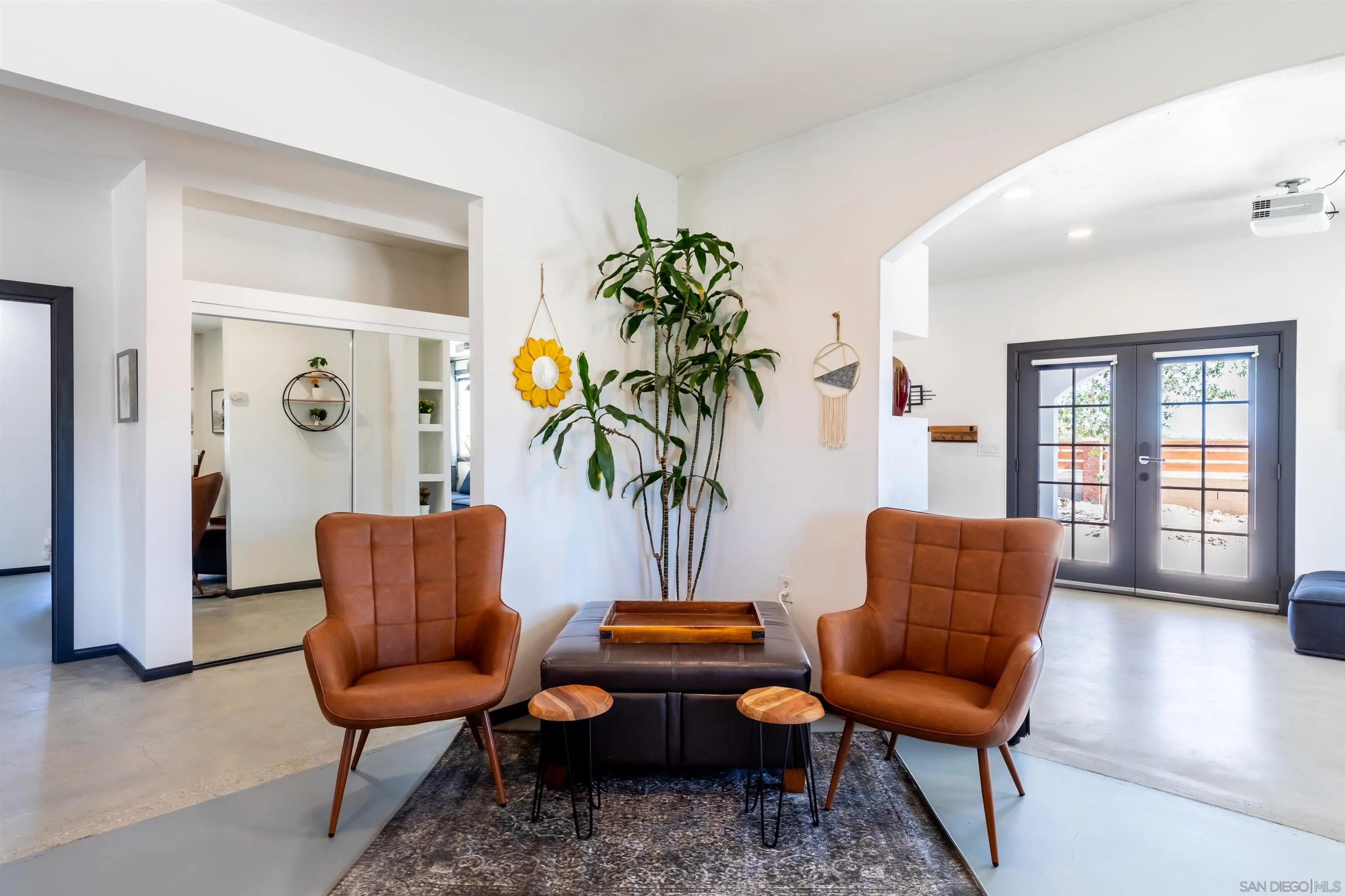 5066 Lear Avenue Twentynine Palms, CA 92277 - Photo 4 of 69 a living room with furniture and a potted plant