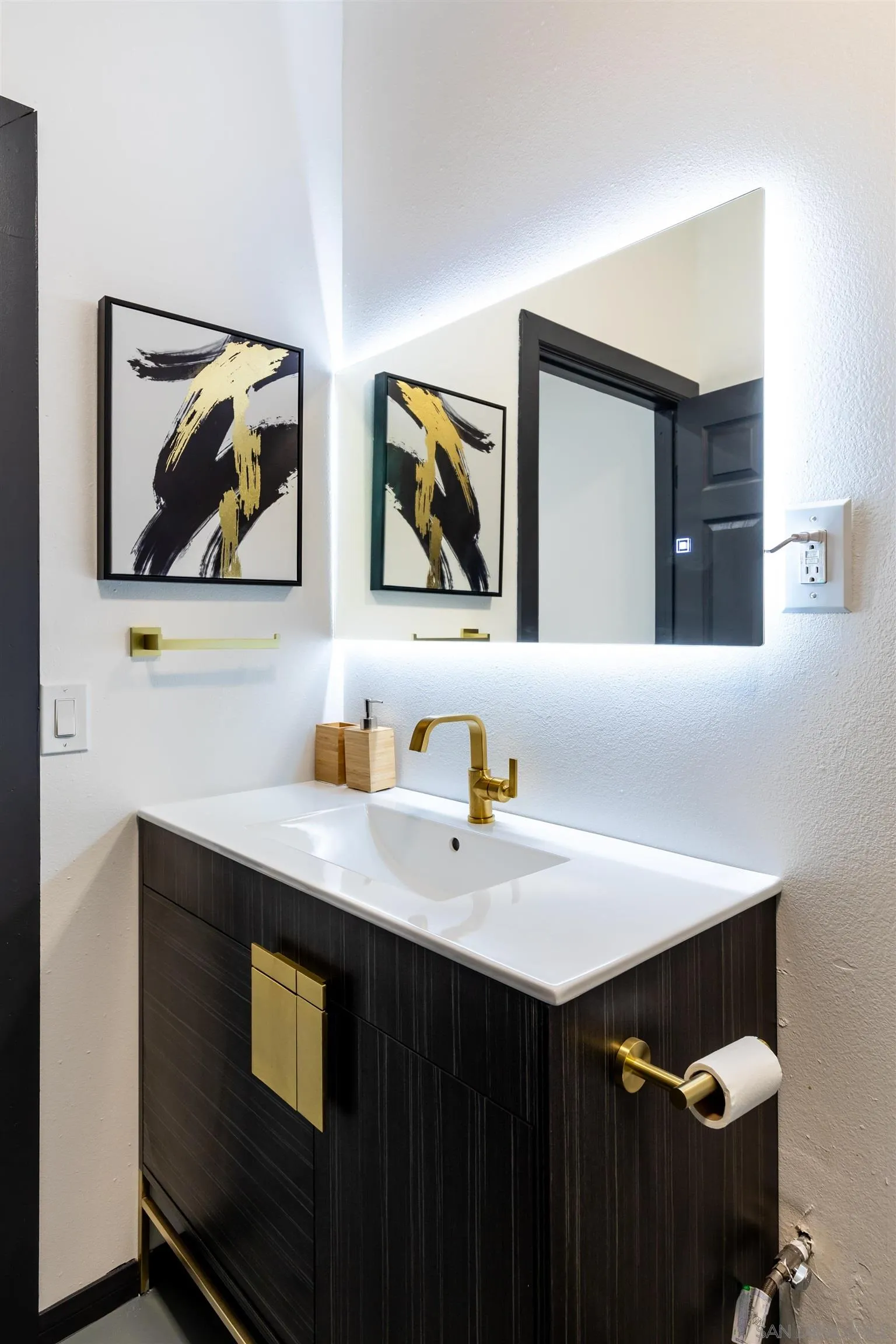 5066 Lear Avenue Twentynine Palms, CA 92277 - Photo 52 of 69 a bathroom with a sink and a mirror