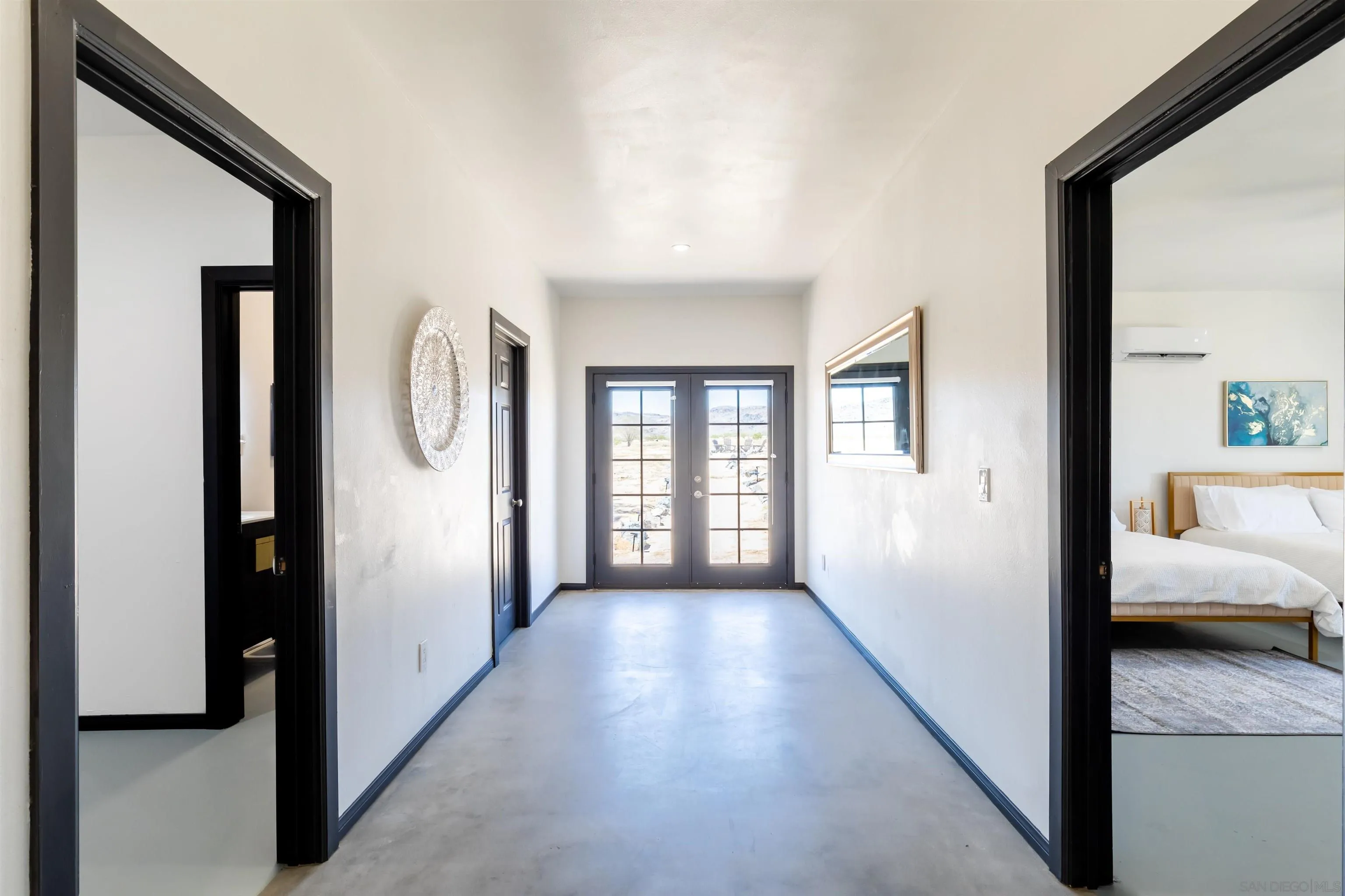 5066 Lear Avenue Twentynine Palms, CA 92277 - Photo 53 of 69 a view of a hallway with a livingroom and a window