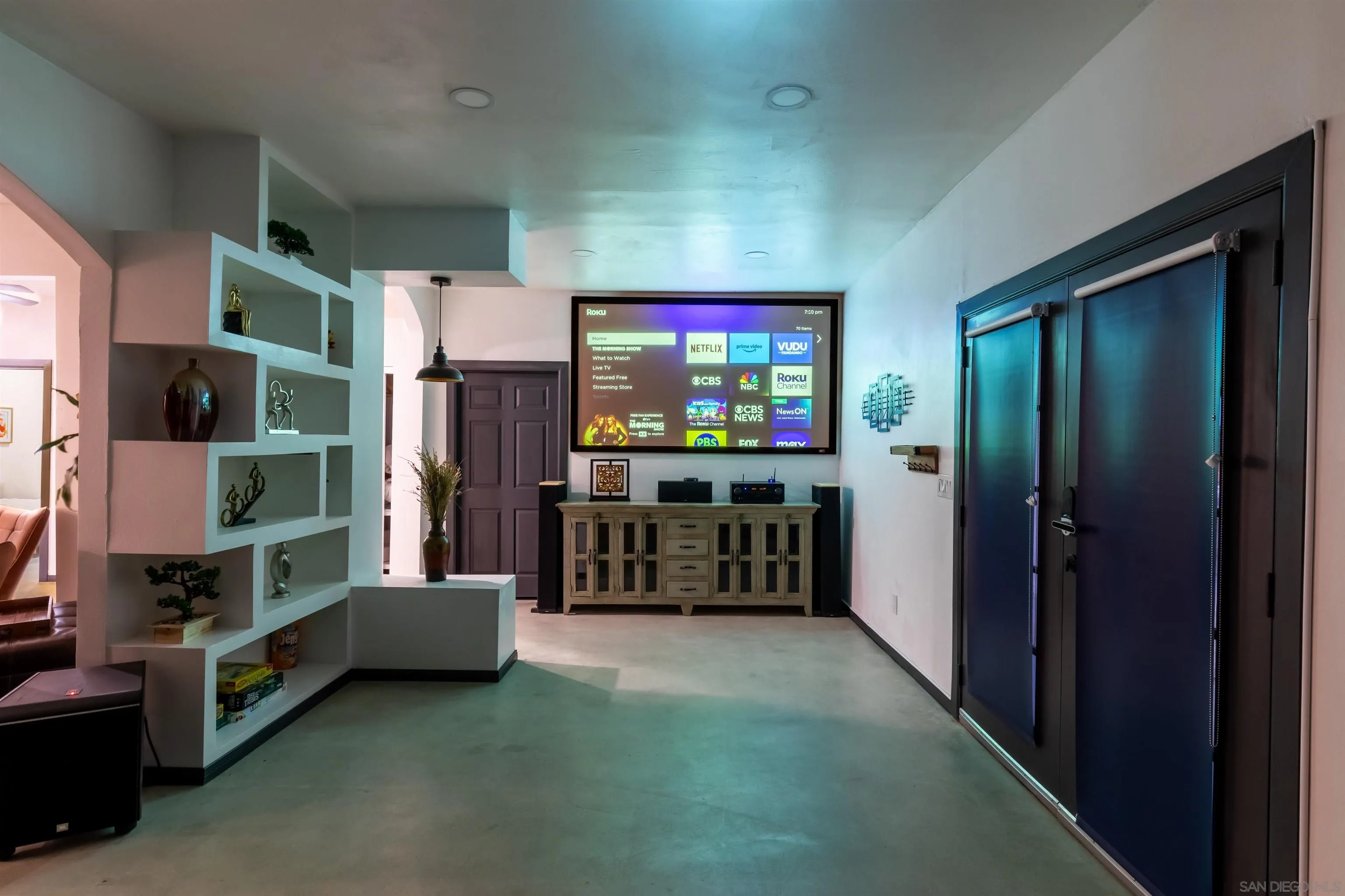 5066 Lear Avenue Twentynine Palms, CA 92277 - Photo 55 of 69 a living room with furniture and a flat screen tv