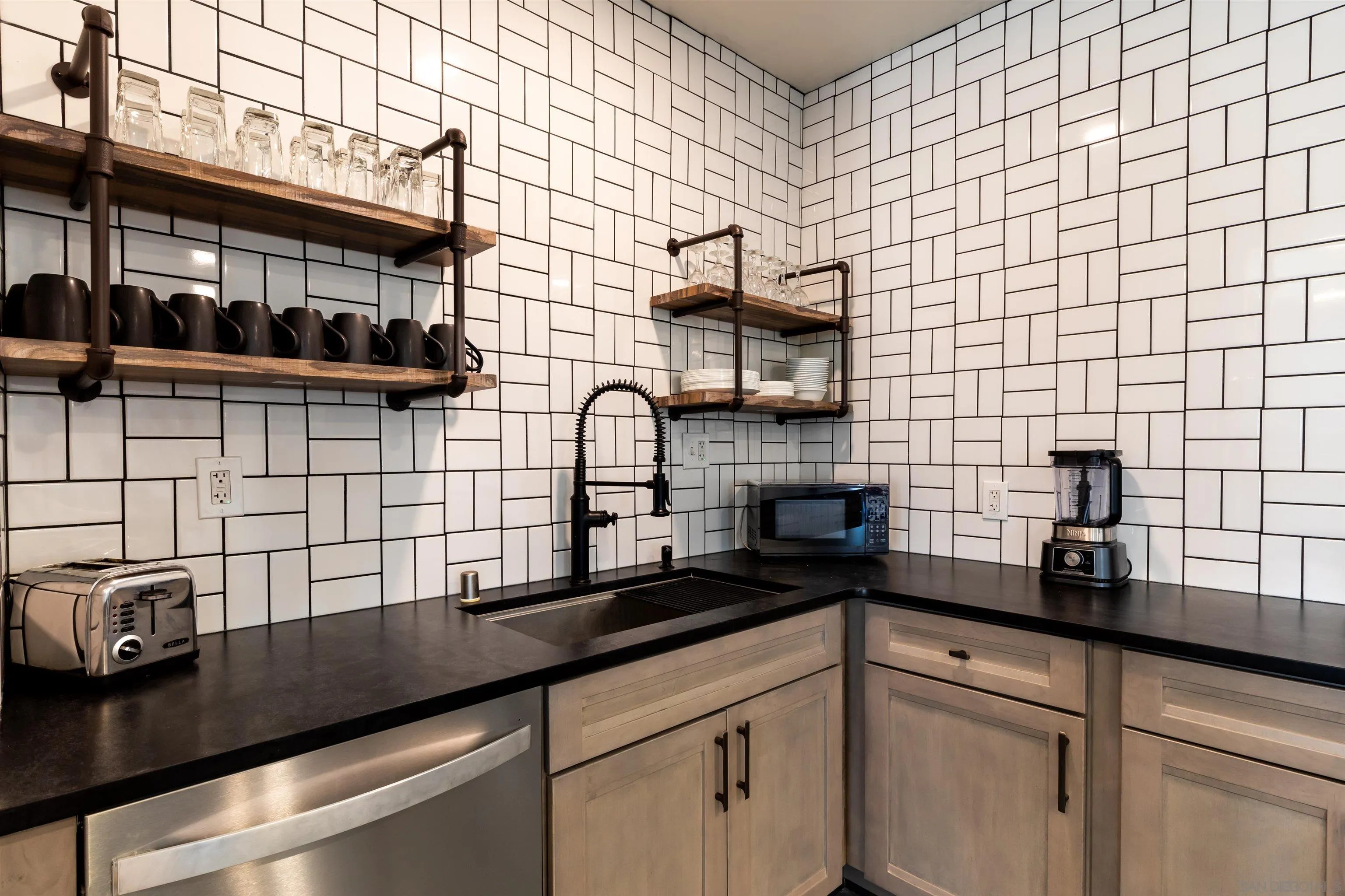 5066 Lear Avenue Twentynine Palms, CA 92277 - Photo 9 of 69 a kitchen with a sink and cabinets