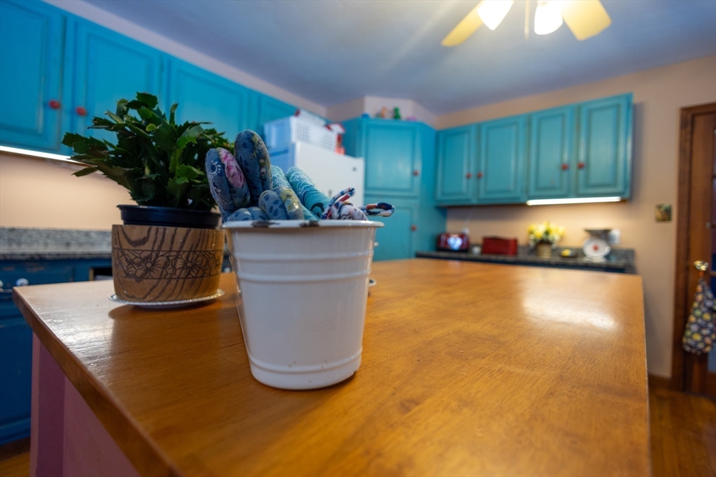 222 Edson Road Oakham, MA 01068 - Photo 10 of 31 a kitchen with a sink a counter and cabinets