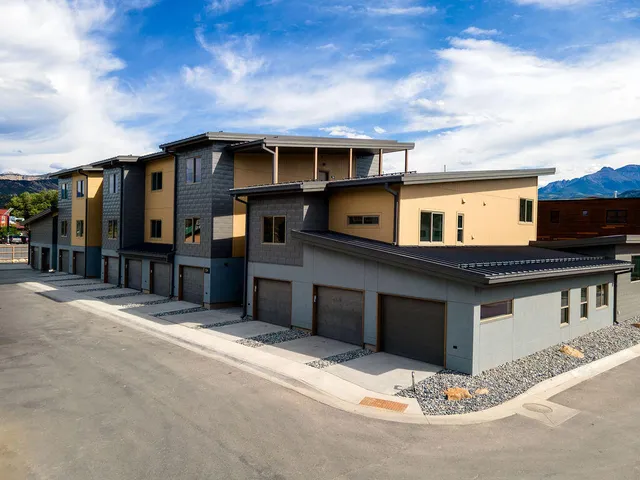 a front view of a house with a garage
