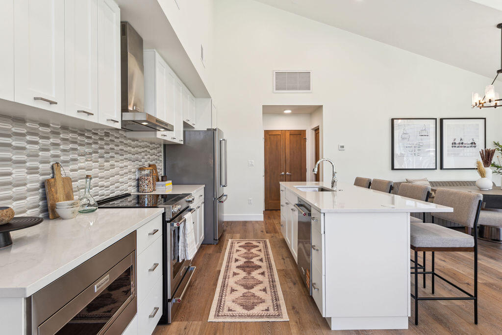 176 Alpine Lane, Unit 300 M2 301 Ridgway, CO 81432 - Photo 29 of 37 a kitchen with a sink stove and refrigerator