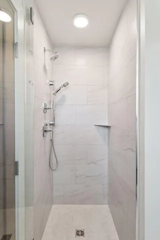 a street view with residential house and car parked