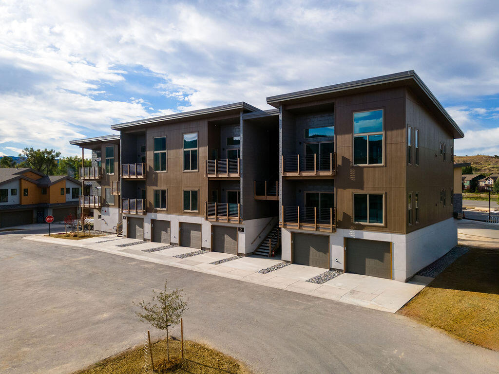176 Alpine Lane, Unit 300 M2 301 Ridgway, CO 81432 - Photo 5 of 37 front view of a house with a street