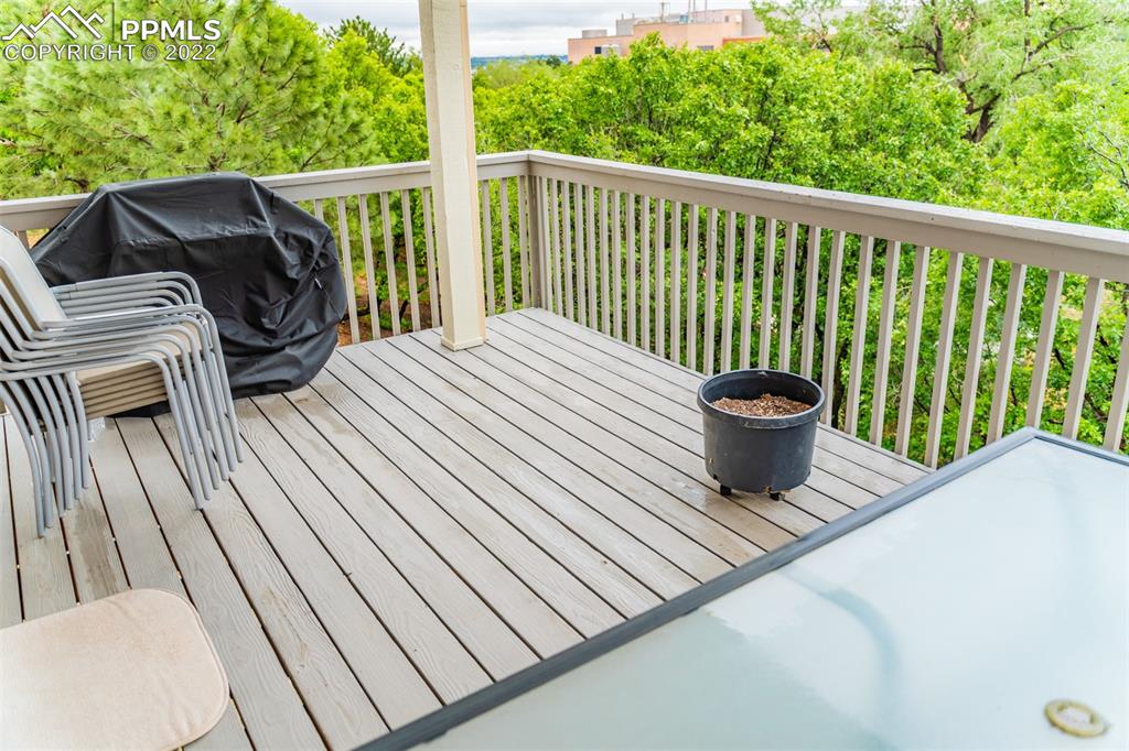 2755 Quail Ridge Point Colorado Springs, CO 80906 - Photo 13 of 35 a view of a balcony with furniture