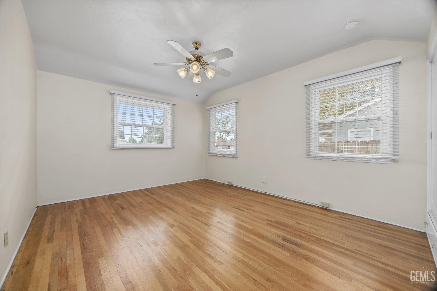 Undisclosed Address Bakersfield, CA 93308 - Photo 24 of 36 a view of empty room with wooden floor