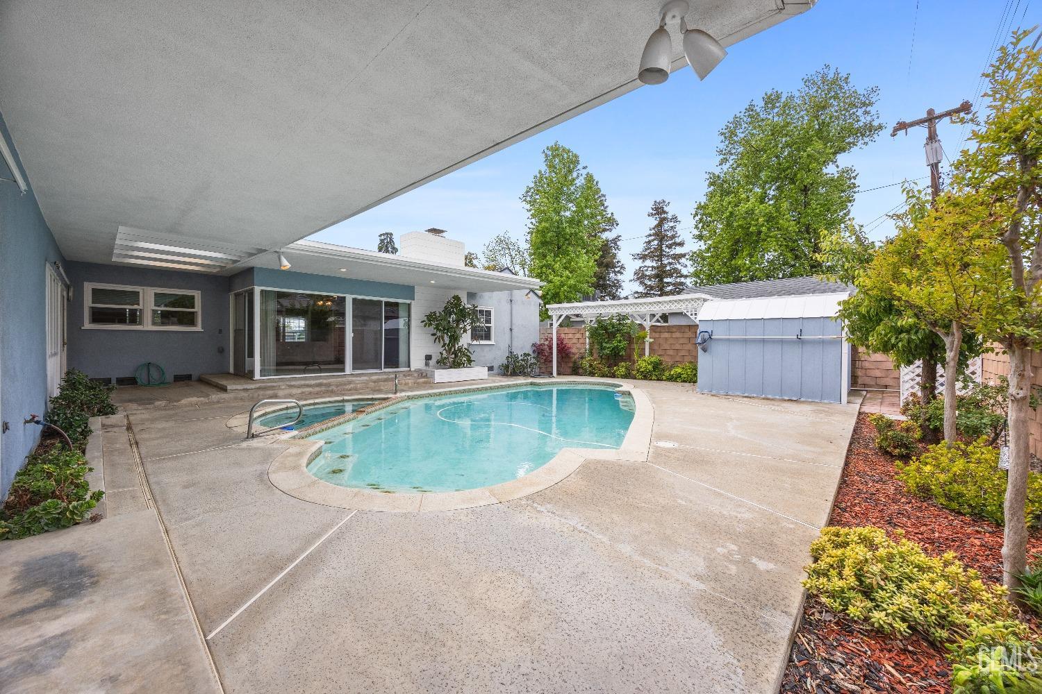 Undisclosed Address Bakersfield, CA 93308 - Photo 33 of 36 front view of a house with a patio