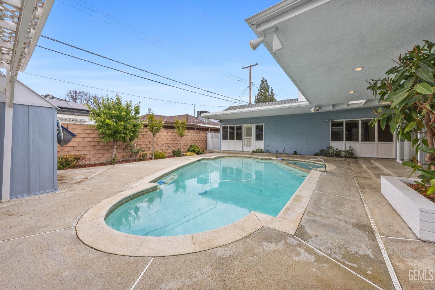 Undisclosed Address Bakersfield, CA 93308 - Photo 35 of 36 a view of outdoor space yard and swimming pool