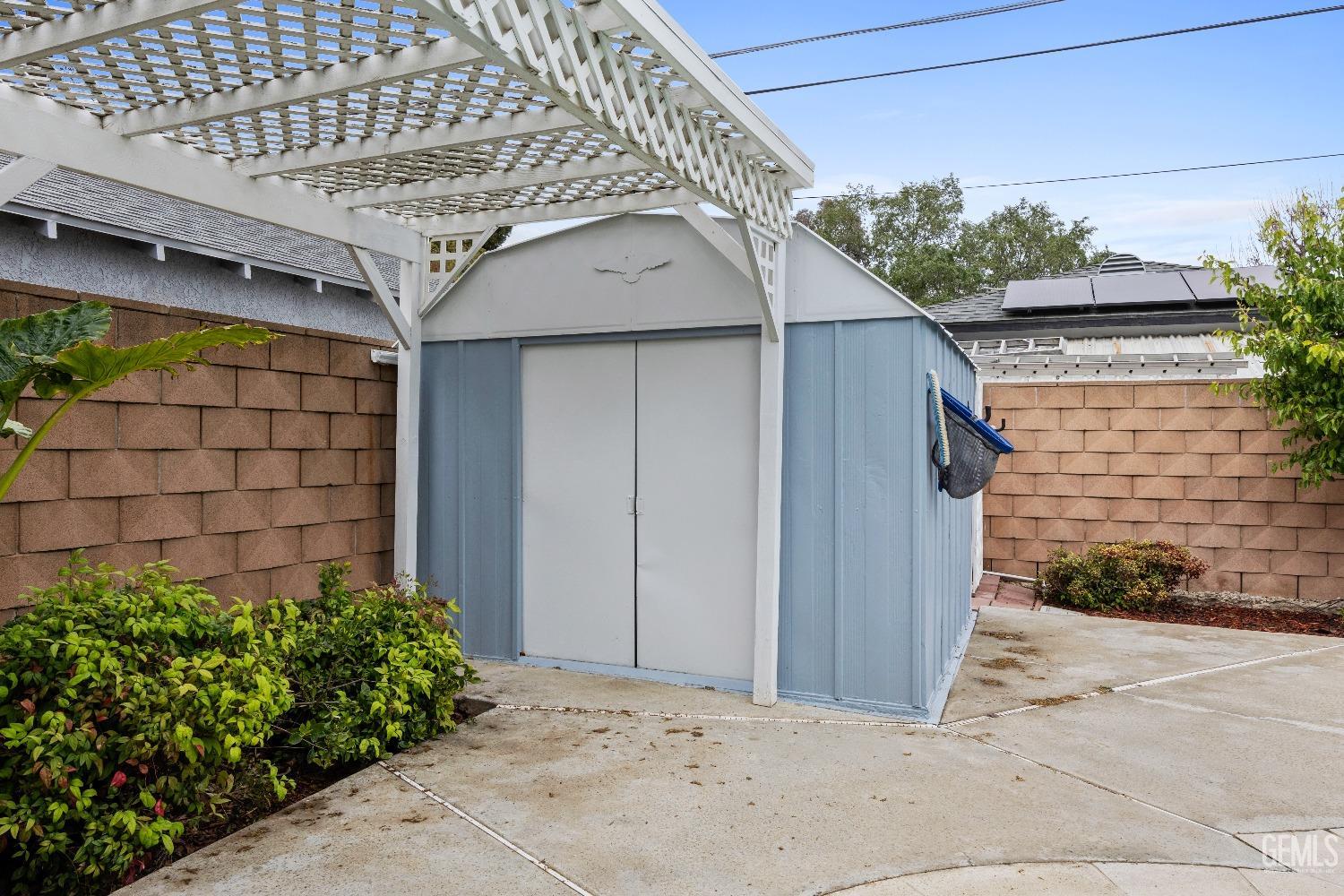 Undisclosed Address Bakersfield, CA 93308 - Photo 36 of 36 a backyard of a house with plants