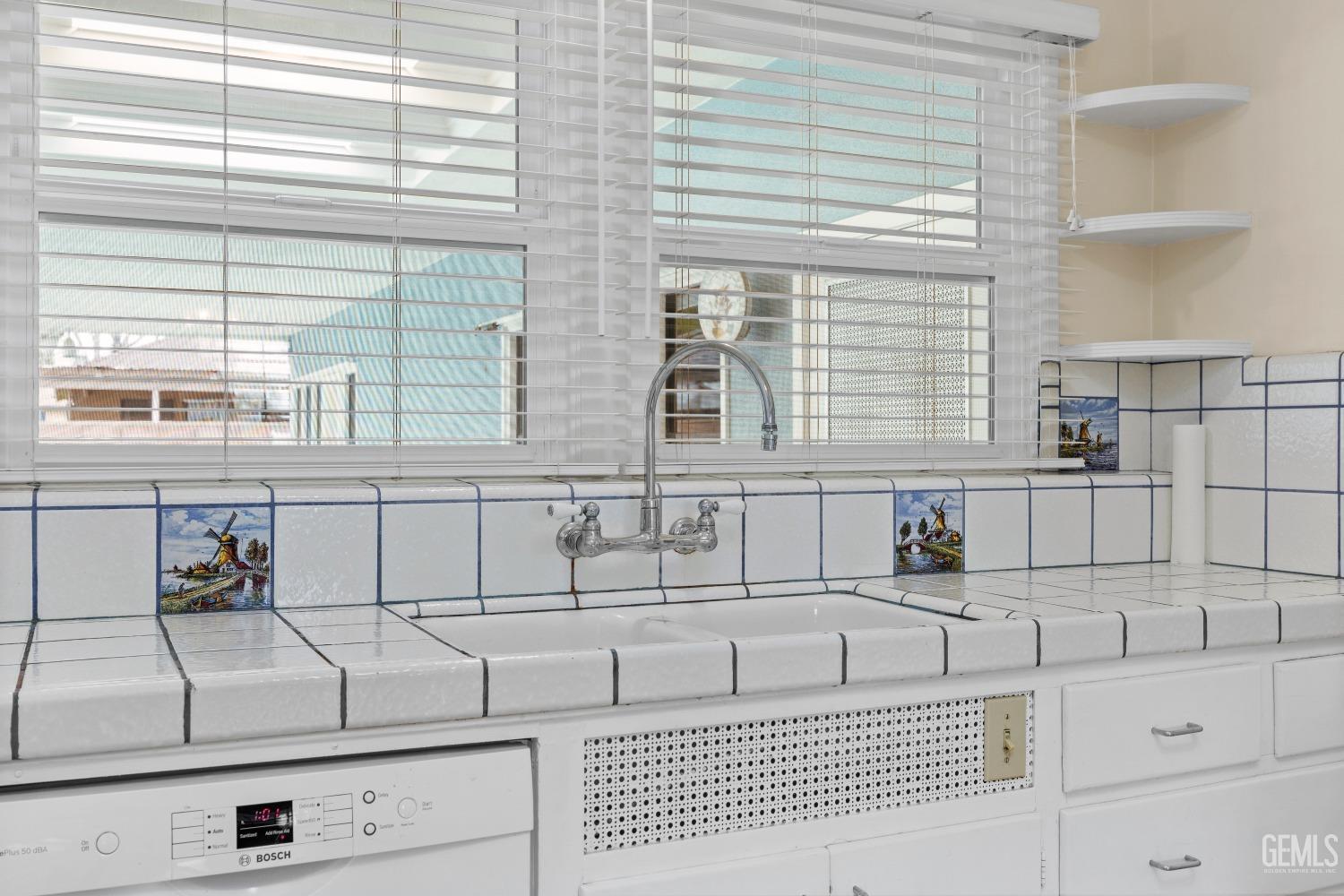 Undisclosed Address Bakersfield, CA 93308 - Photo 10 of 36 a bathroom with a bathtub and next to a window