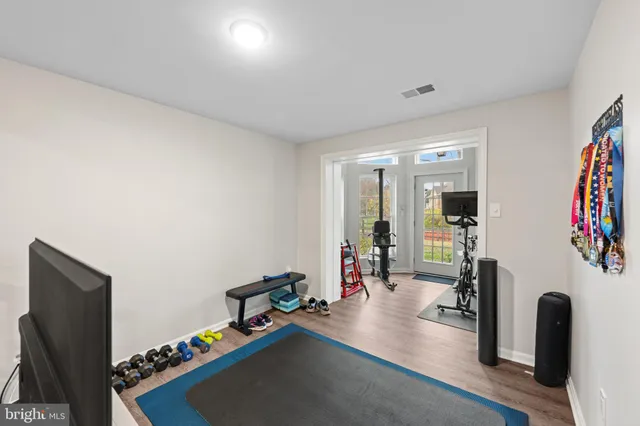 a view of a room with gym equipment