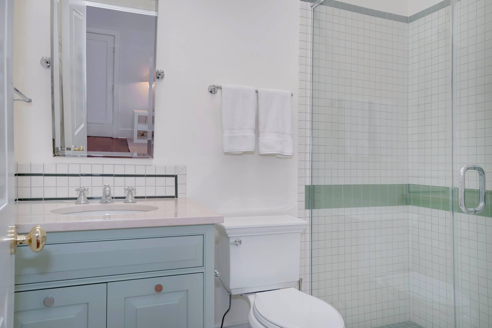 23 Deer Run Water Mill, NY 11976 - Photo 11 of 16 a bathroom with a sink a toilet and mirror