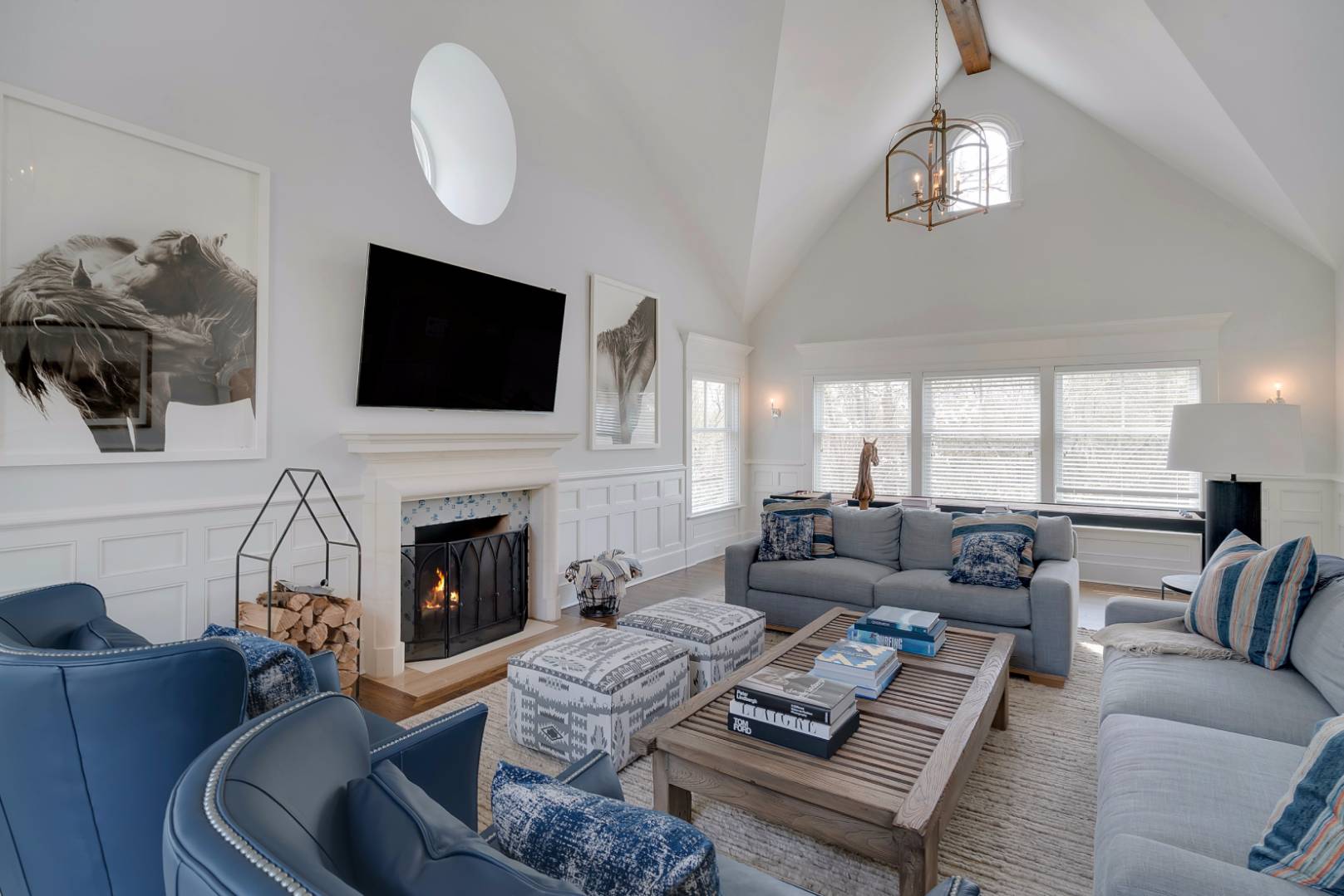23 Deer Run Water Mill, NY 11976 - Photo 4 of 16 a living room with furniture a fireplace and a flat screen tv