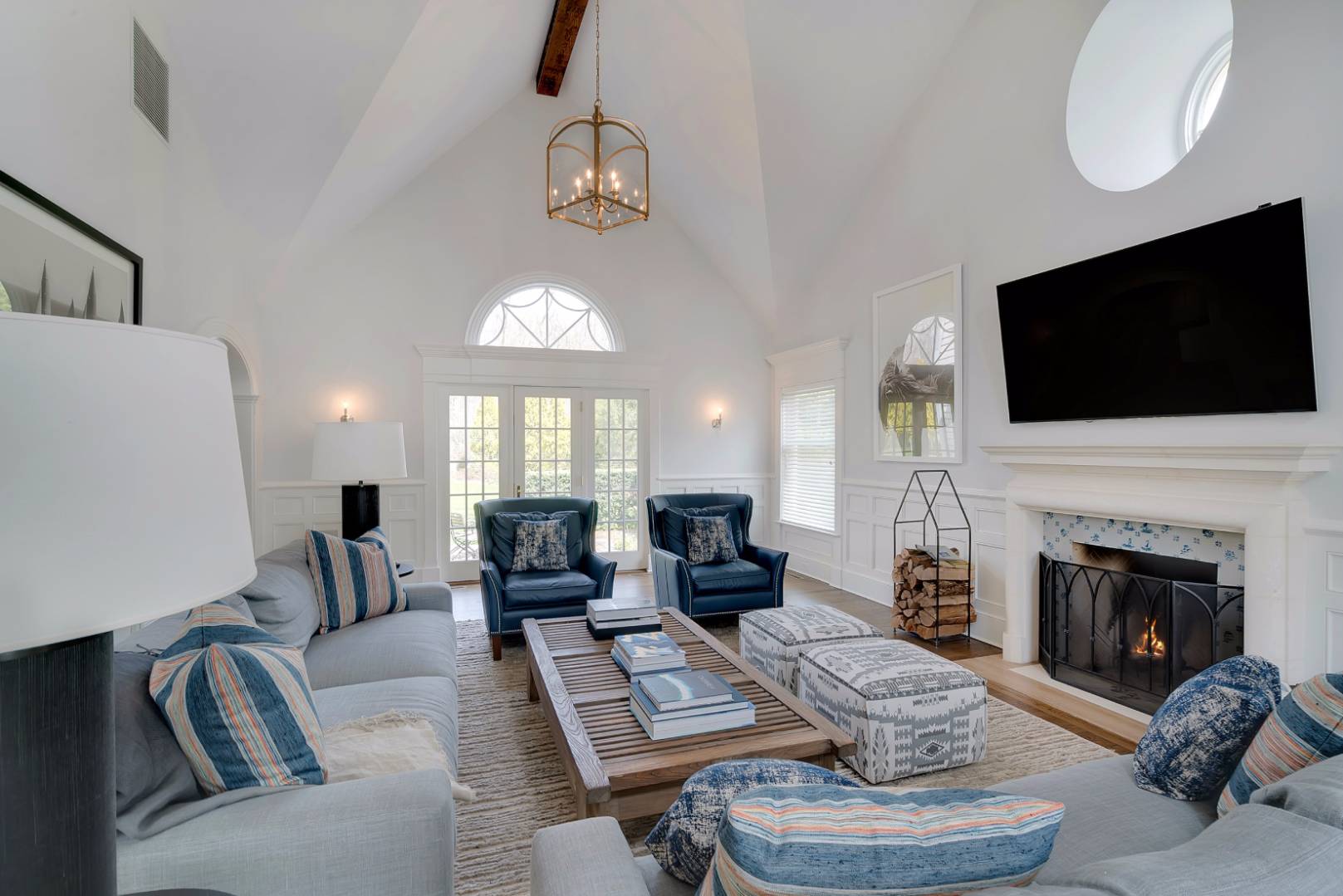23 Deer Run Water Mill, NY 11976 - Photo 5 of 16 a living room with furniture fireplace and flat screen tv