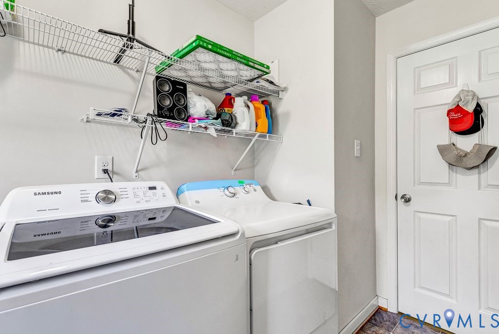 1018 Eubanks Road Dunnsville, VA 22454 - Photo 19 of 26 a utility room with dryer and washer