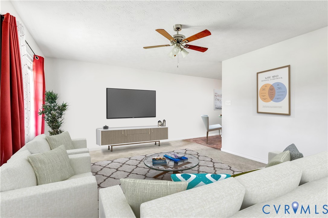 1018 Eubanks Road Dunnsville, VA 22454 - Photo 4 of 26 a living room with furniture and a flat screen tv