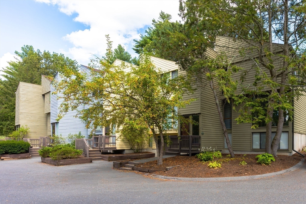 511 Tumbling Hawk, Unit 511 Acton, MA 01718 - Photo 2 of 42 front view of a house with a street