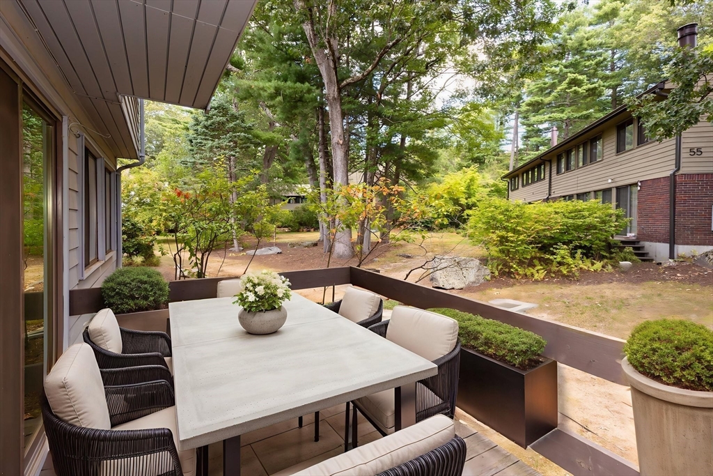 511 Tumbling Hawk, Unit 511 Acton, MA 01718 - Photo 10 of 42 a outdoor dining space with furniture and potted plants
