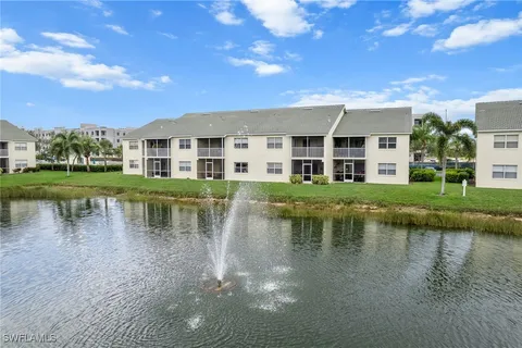 a view of a house with a lake view