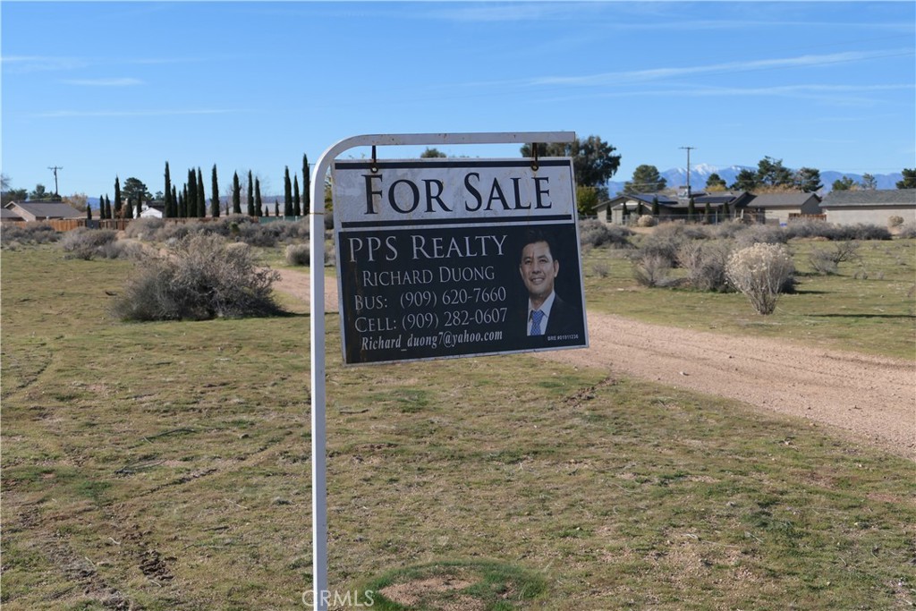 0 Passo Road Apple Valley, CA 92308 - Photo 14 of 16 a sign that is on the side of a building