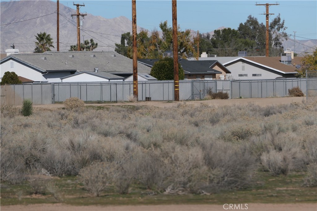 0 Passo Road Apple Valley, CA 92308 - Photo 2 of 16 a view of a back yard of the house