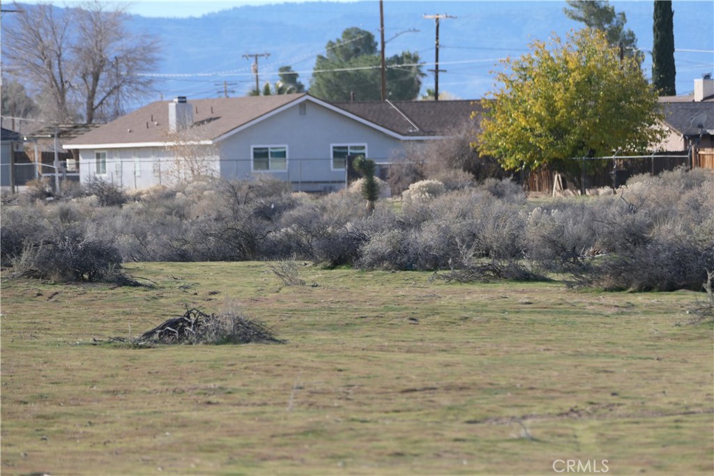 0 Passo Road Apple Valley, CA 92308 - Photo 5 of 16 a view of a house with a yard