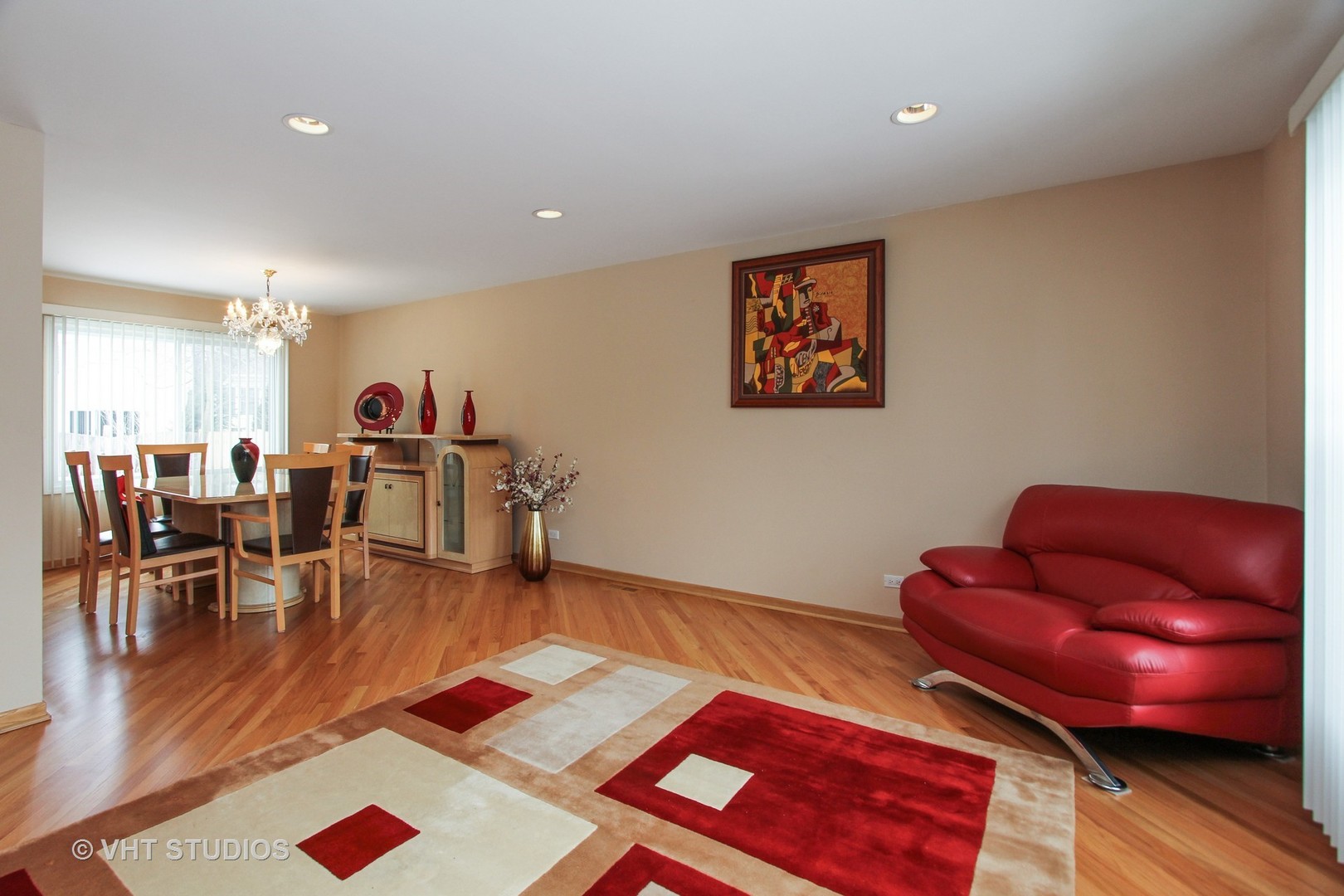 1104 Devonshire Road Buffalo Grove, IL 60089 - Photo 2 of 10 a living room with furniture a rug and a table