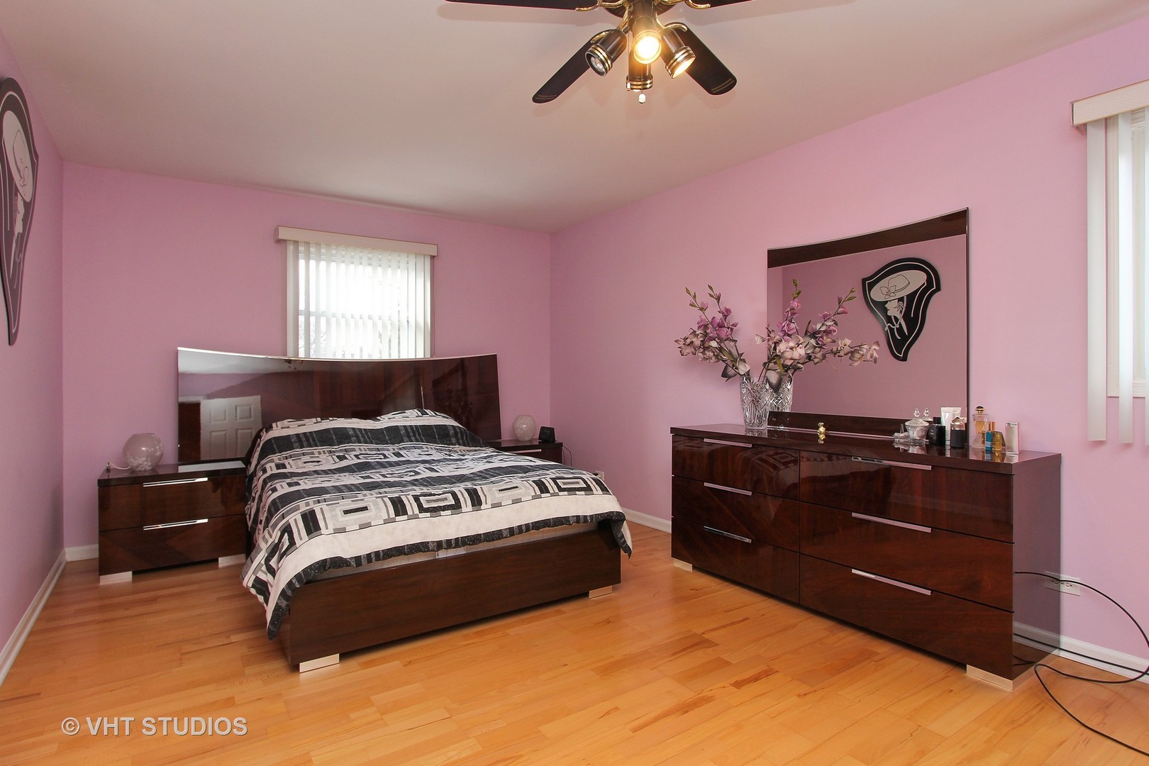 1104 Devonshire Road Buffalo Grove, IL 60089 - Photo 5 of 10 a bedroom with a bed and a dresser